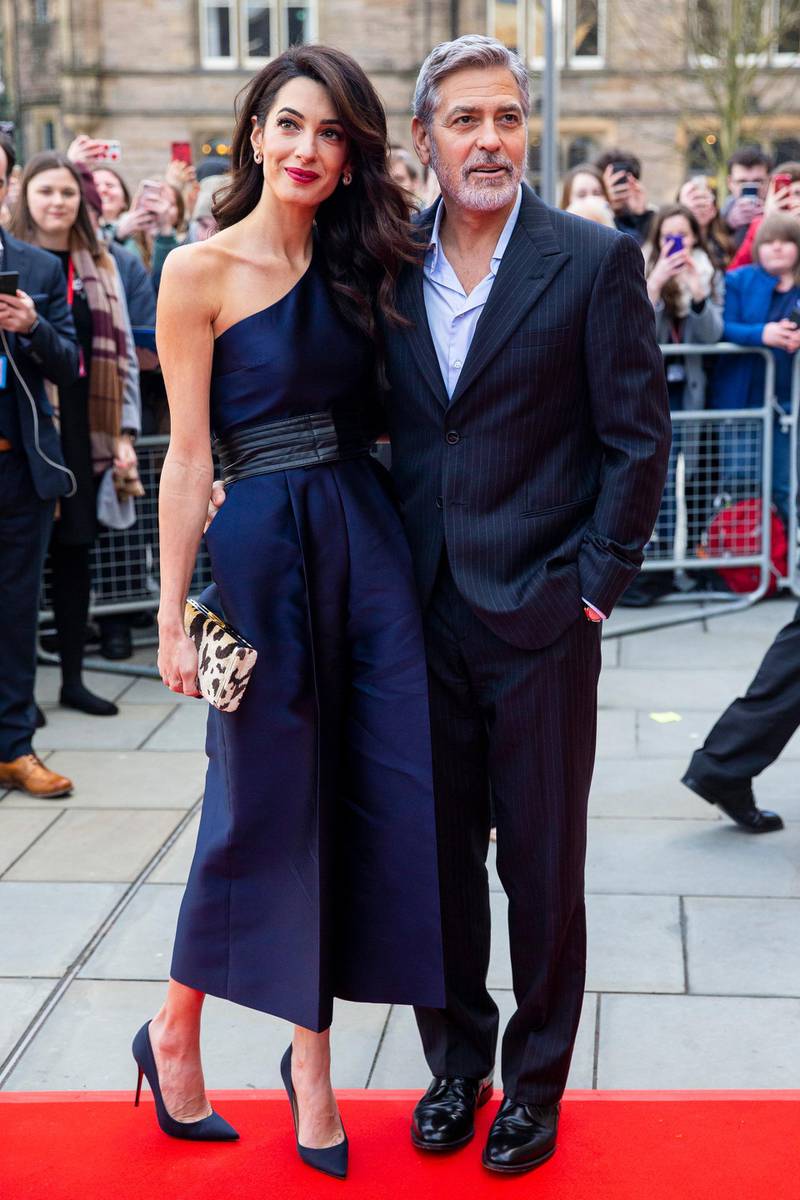 EDINBURGH, SCOTLAND - MARCH 14: George and Amal Clooney attend the Peopleâ€™s Postcode Lottery Charity Gala at McEwan Hall on March 15, 2019 in Edinburgh, Scotland. The couple will be honoured for their international humanitarian work through the Clooney Foundation for Justice. (Photo by Duncan McGlynn/Getty Images)