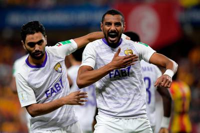 Al Ain's Mohamed Ahmed, right, celebrates after scoring a goal with El Shahat. AFP