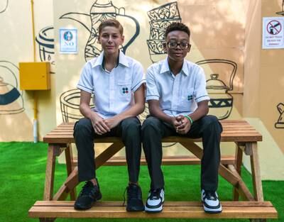 Roman Sokhan, 12, and Walter Clarke, 11, are both starting Grade 6. Victor Besa / The National