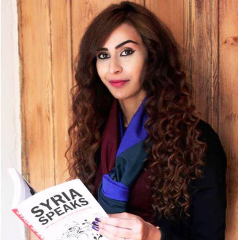 Muslim woman detained for reading Syria art book on plane to sue