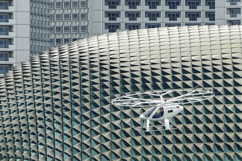 SINGAPORE, SINGAPORE - OCTOBER 22: A prototype of Volocopter air taxi in flight during test flight over Marina Bay on October 22, 2019 in Singapore. (Photo by Ore Huiying/Getty Images)
