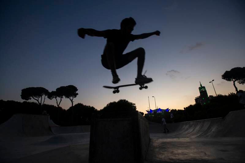 Skateboarder Danny Sultan, 25, ollies over a concrete slab as the sun starts to set in the city of Beirut.
