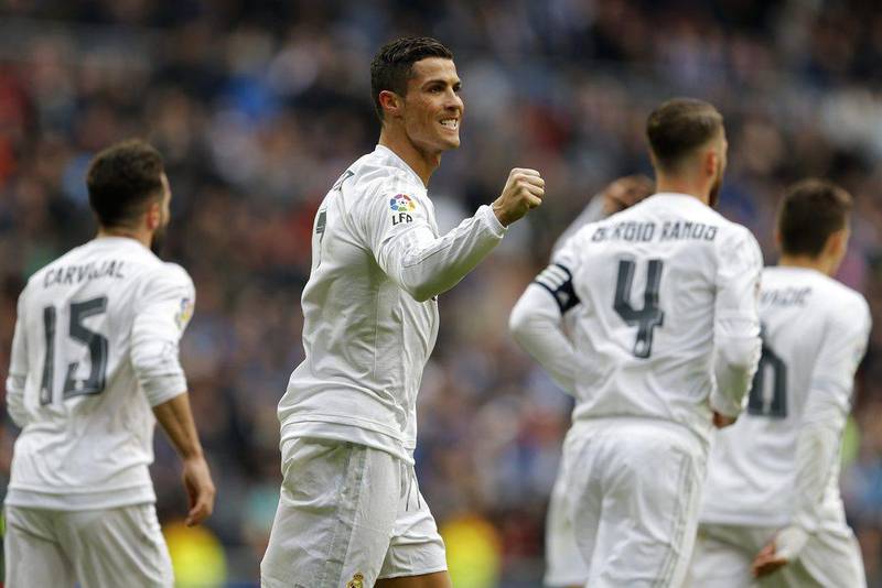 Real Madrid's Cristiano Ronaldo celebrates after scoring a goal against Celta during a Spanish La Liga soccer match between Real Madrid and Celta Vigo at the Santiago Bernabeu stadium in Madrid, Saturday, March 5, 2016. Ronaldo scored four goals in Real Madrid's 7-1 victory. (AP Photo/Francisco Seco)