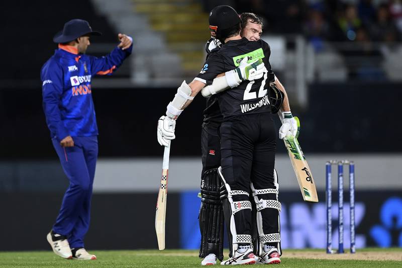 New Zealand's Tom Latham celebrates his century with Kane Williamson in the first ODI against India. AP
