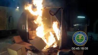 This frame grab from a video, provided by the Federal Aviation Administration (FAA), shows a battery test at the FAA's technical center in Atlantic City, New Jersey.  FAA via AP Photo