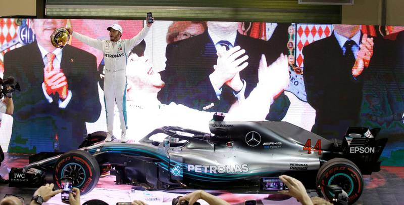 Mercedes driver Lewis Hamilton celebrates his victory. AP Photo