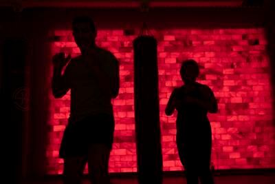 Studio 14 in Dubai has a Himalayan salt wall, which is beneficial when you're working out indoors in close proximity with others. Antonie Robertson / The National