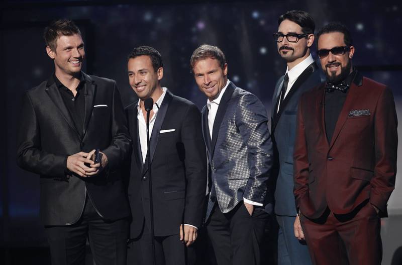 Backstreet Boys presented the award for New Artist of the Year at the 40th American Music Awards in Los Angeles, California, in 2012