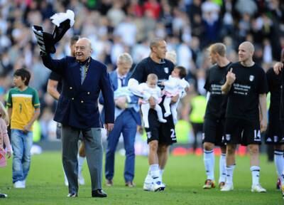 Mr Al-Fayed salutes the Fulham crowd at Craven Cottage in 2011. Getty Images