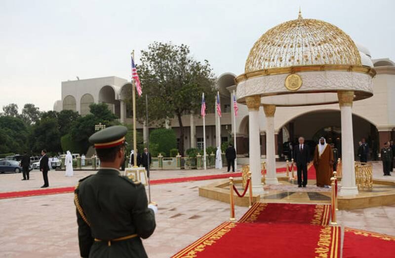 President Sheikh Khalifa and then-US president George W Bush stand for their national anthems in the courtyard of Al Mushrif Palace in Abu Dhabi. Photo: National Archives