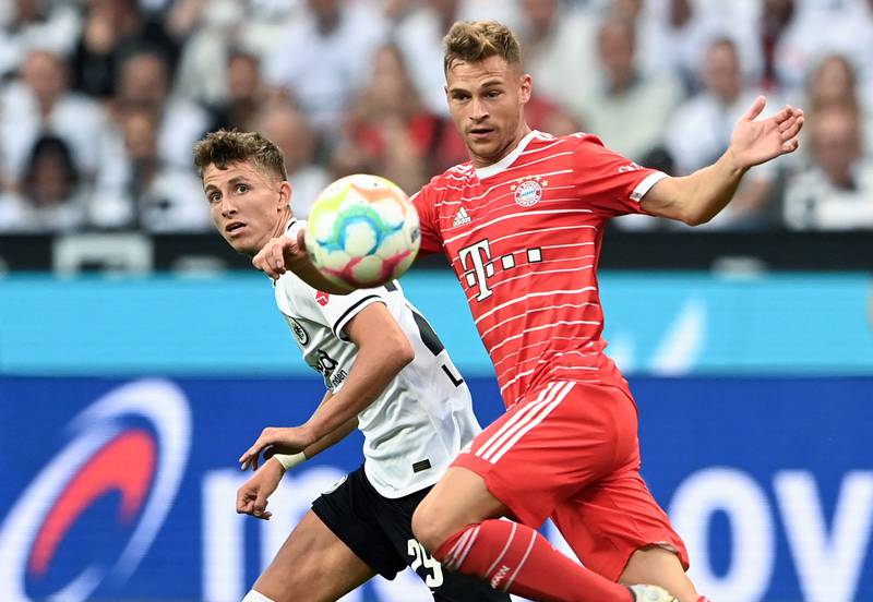 Frankfurt's Danish midfielder Jesper Lindstroem and Bayern Munich's German midfielder Joshua Kimmich vie for the ball. AFP