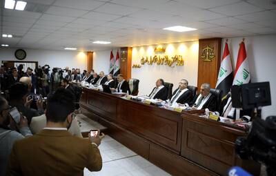 Judge Jassim Mohammed Aboud, head of the Iraqi Federal Supreme Court, and other judges attending a session in Baghdad in January. EPA
