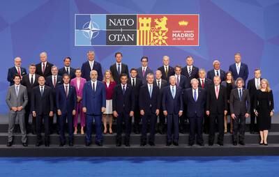 World leaders pose for a photo during the summit. Reuters