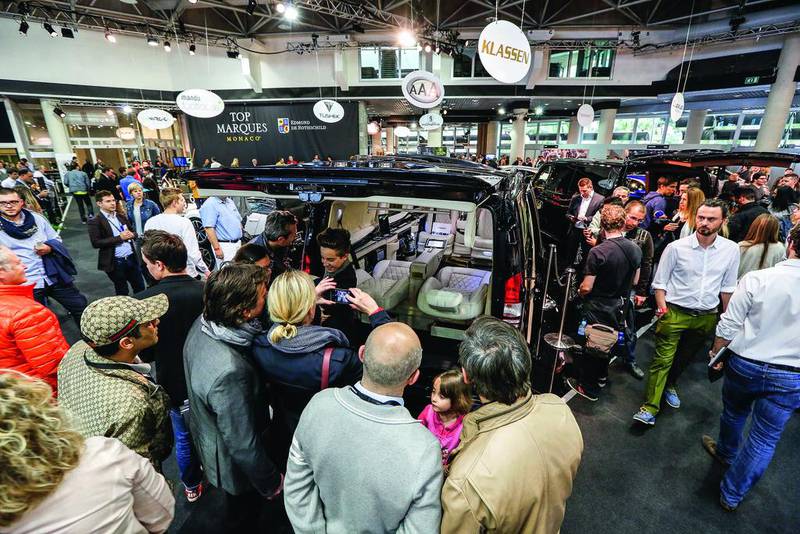 Visitors peruse the Top Marques motor show in Monaco. Courtesy Nick Hall