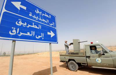 A Saudi border guards' vehicle patrols the fence separating Saudi Arabia and Iraq, in the area around Arar city along the Saudi-Iraq border on March 12, 2017. (Photo by FAYEZ NURELDINE / AFP)
