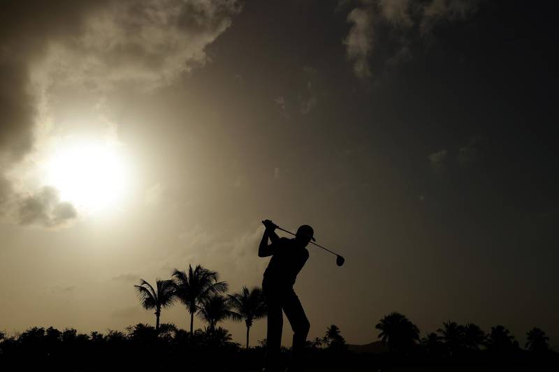 Arjun Atwal of India plays his shot from the first tee during the first round of the Puerto Rico Open at Coco Beach Golf and Country Club on Thursday, February 20. AFP
