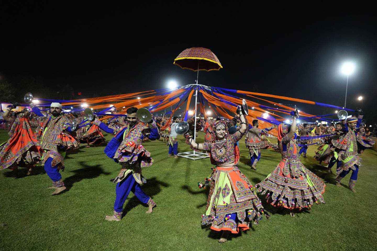 Indians in traditional dress perform the garba, the traditional dance of Gujarat state, during Navratri festival celebrations in Ahmedabad, India, September 27, 2022.  AP