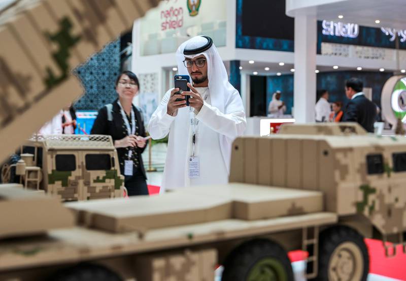 Abu Dhabi, U.A.E., February 17, 2019. INTERNATIONAL DEFENCE EXHIBITION AND CONFERENCE  2019 (IDEX) Day 1--An IDEX visitor takes a photo of the AR3 Guided Multiple Rocket System.Victor Besa/The NationalSection:  NAReporter;