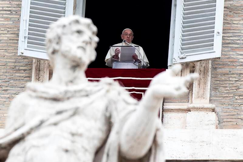 Pope Francis leads a prayer from the window of his office, in Vatican City, on November 1. EPA