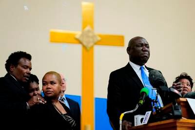 Attorney Benjamin Crump, accompanied by the family of Ruth Whitfield, a victim of shooting at a supermarket, speaks to the media during a news conference in Buffalo, New York. AP