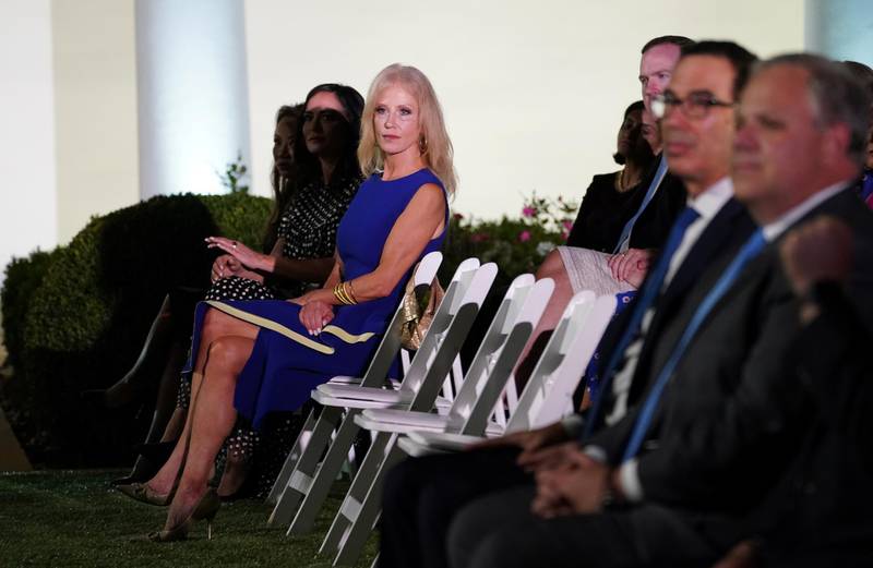 Kellyanne Conway waits for US first lady Melania Trump to arrive to deliver her live address to the largely virtual 2020 Republican National Convention from the Rose Garden of the White House. Reuters