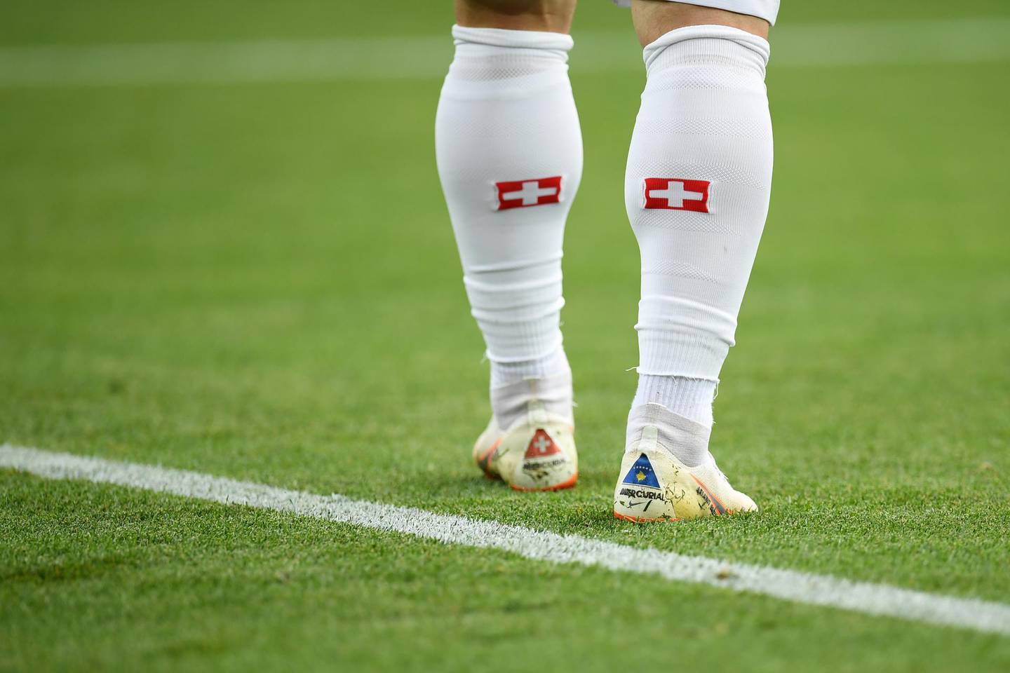 KALININGRAD, RUSSIA - JUNE 22:  The Kosovo flag is seen on Xherdan Shaqiri of Switzerland's boots during the 2018 FIFA World Cup Russia group E match between Serbia and Switzerland at Kaliningrad Stadium on June 22, 2018 in Kaliningrad, Russia.  (Photo by Matthias Hangst/Getty Images)