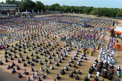 Indian school students take part in a yoga camp in Hyderabad.  Noah Seelam / AFP Photo