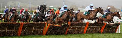 Runners clear a hurdle during the Daylesford Mares' Novices' Hurdle on Day 3 of the Cheltenham Festival, on Thursday, March 12. Getty