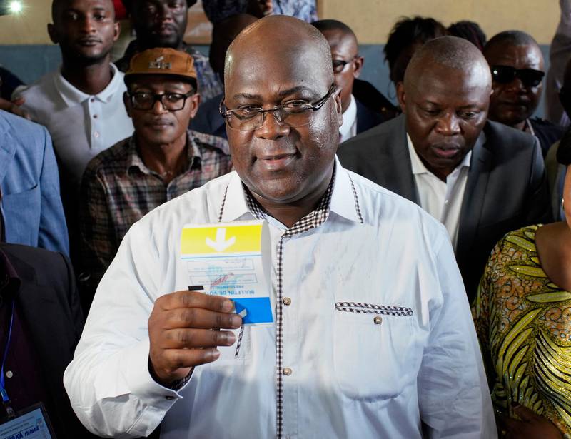 FILE - In this Dec. 30, 2018, file photo, opposition presidential candidate Felix Tshisekedi casts his ballot in Kinshasa. Congo opposition leader Tshisekedi has won the presidential election, the electoral commission announced early Thursday, Jan. 10 ,2019, as the vast country braced for possible protests over alleged rigging. (AP Photo/Jerome Delay, File)