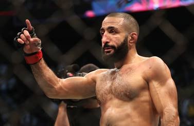 Belal Muhammad (grün) stoppt Sean Brady in einem Kampf im Weltergewicht bei UFC 280 in Abu Dhabi.  Chris Whiteoak / The National