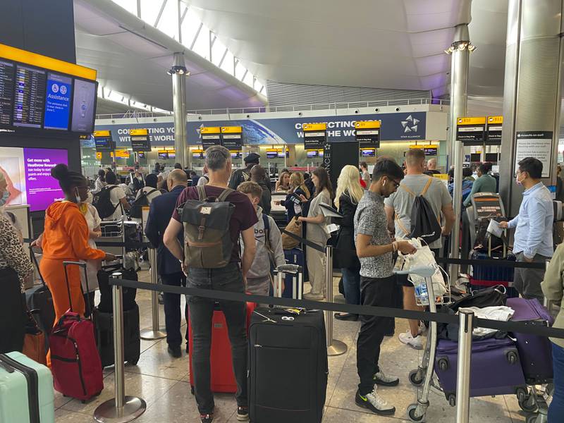 Passengers queue to check in at Terminal 2 at Heathrow Airport, London. Photo: Press Association