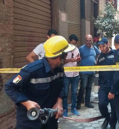Firefighters at the church in the aftermath of the deadly blaze. Photo: Ministry of the Interior