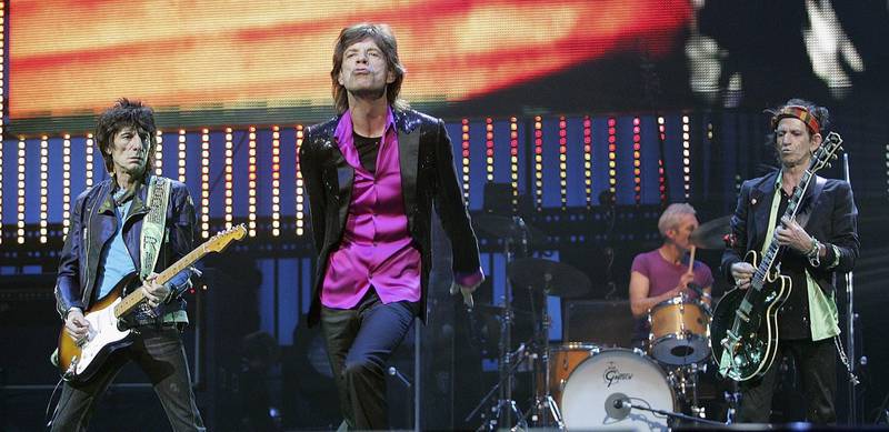 SAITAMA, JAPAN - APRIL 2: (L to R) Ronnie Wood, Mick Jagger, Charlie Watts and Keith Richards of The Rolling Stones perform during a concert at Saitama Super Arena on April 2, 2006 in Saitama, Japan. The Rolling Stones are in Japan to play in 5 cities around the country as part of their Bigger Bang world tour. (Photo by Junko Kimura/Getty Images)
