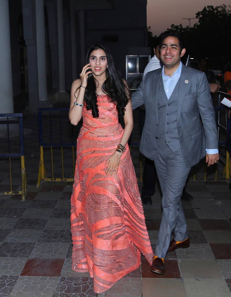 One of the few guests officially pictured, Indian businessman Akash Ambani and his fiancée Shloka Mehta arrive at the airport after attending the wedding of Bollywood actress Priyanka Chopra and Nick Jonas in Jodhpur, India, Saturday, Dec. 1, 2018. Photo: AP / Sunil Verma