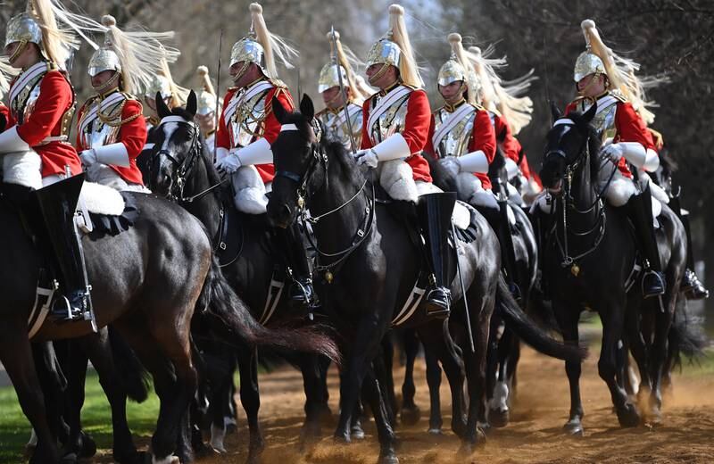 Members of the Household Cavalry Mounted Regiment take part in the Maj Gen's Inspection in Hyde Park. The ceremonial unit must pass the inspection to take part in state duties. EPA