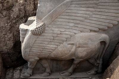 The human-headed winged bull sculpture discovered with its entire wings intact at the archaeological site of Khorsabad. AFP