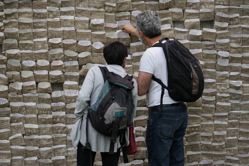 The installation allows visitors to pick up letters written by the Lebanese following the August 4 explosion at the Beirut Port. Courtesy of the artists