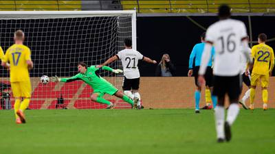 Ukraine goalkeeper Andrey Pyatov fails to Germany forward Timo Werner making it 3-1. AFP