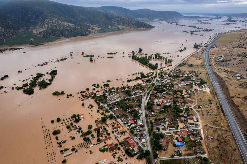 At least six people died and another six are missing in a flooded central Greek region. EPA