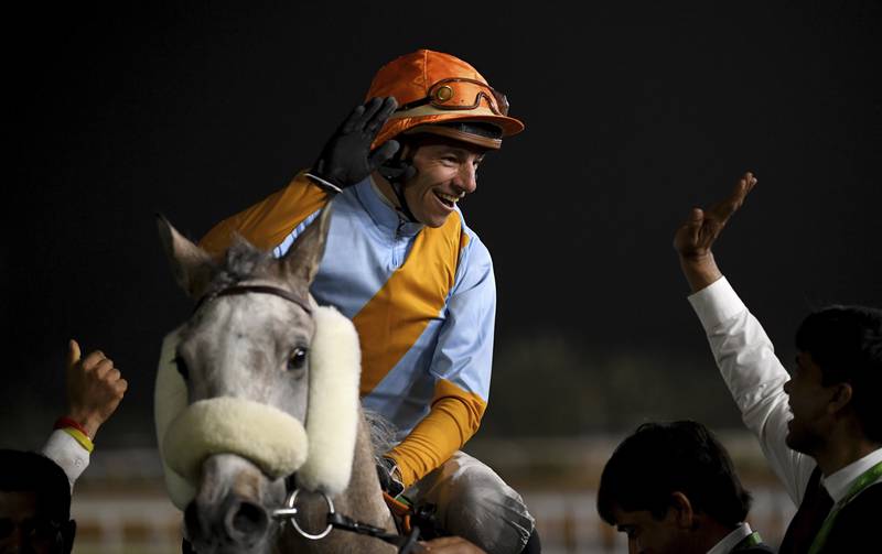 Jockey Ronan Thomas reacts after winning the $1 million Al Mneefah Cup. AP