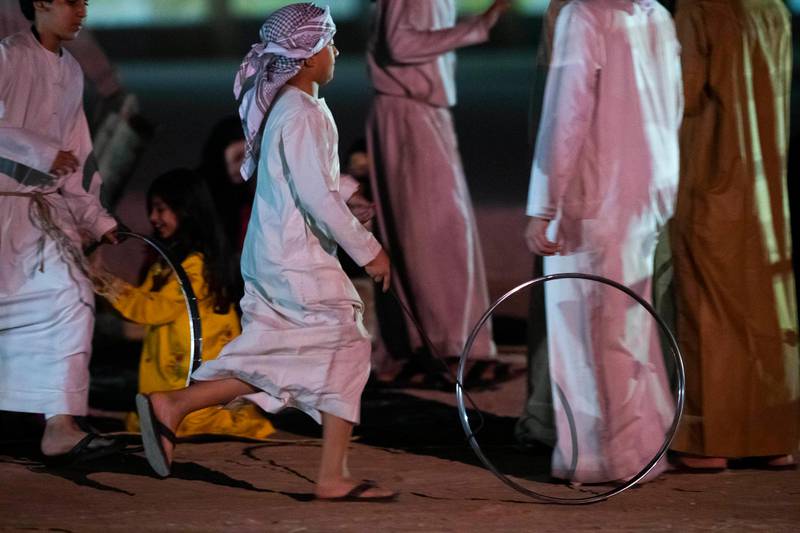 Performers participate in a show during the opening of Qasr Al Hosn.