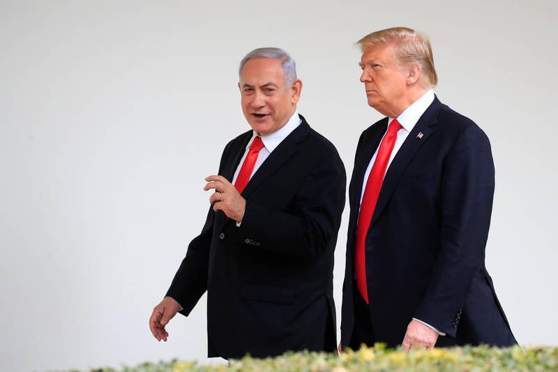 FILE - In this March 25, 2019, file photo, President Donald Trump and visiting Israeli Prime Minister Benjamin Netanyahu walk along the Colonnade of the White House in Washington. Netanyahu on Wednesday, Aug. 21, 2019, is steering clear of Trumpâ€™s comments questioning the loyalty of American Jews who support the Democratic Party, ignoring condemnation from Jewish critics who accuse him of voicing longstanding anti-Semitic tropes. (AP Photo/Manuel Balce Ceneta, File)