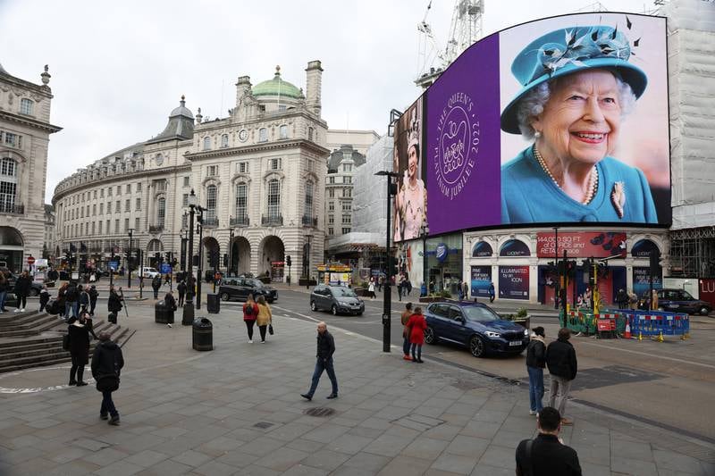 A portrait of Queen Elizabeth II is displayed on the large screen at Piccadilly Circus, London, to mark the start of her platinum jubilee on February 6. Getty