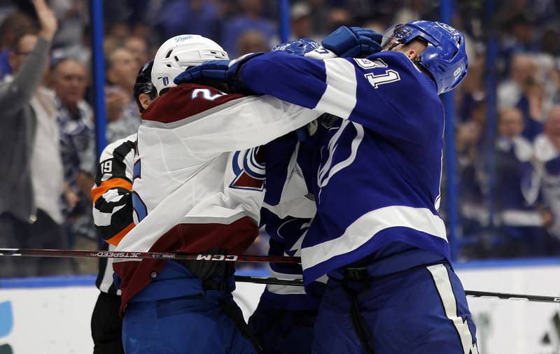 Colorado Avalanche right wing Logan O'Connor (25) and Tampa Bay Lightning defenseman Erik Cernak (81) push each other during the first period. Reuters