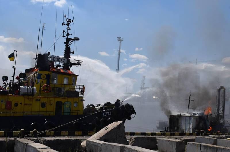 Firefighters battle blazes at the Ukrainian sea port of Odesa after the missile attacks. Photo: Odesa City Hall Press Office / EPA