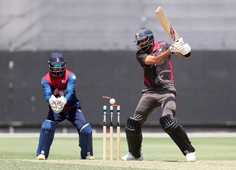 Nepal's Sandeep Lamichhane bowls UAE's Ahmed Raza.  Chris Whiteoak / The National