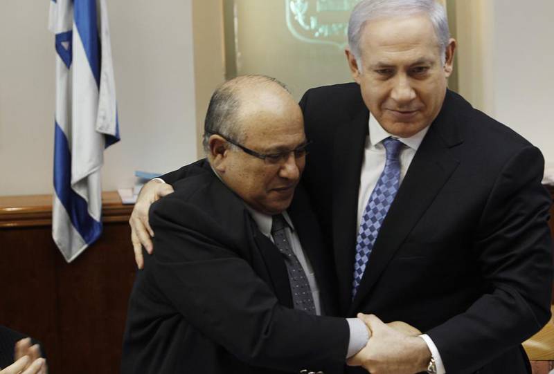 Israeli prime minister Benjamin Netanyahu, right, embraces the outgoing director of  Mossad, Meir Dagan, in Jerusalem in 2011.   AFP 