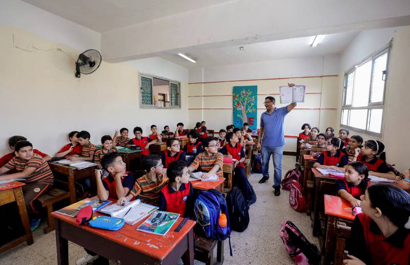 A teacher conducts a lesson at a school in Cairo. Reuters