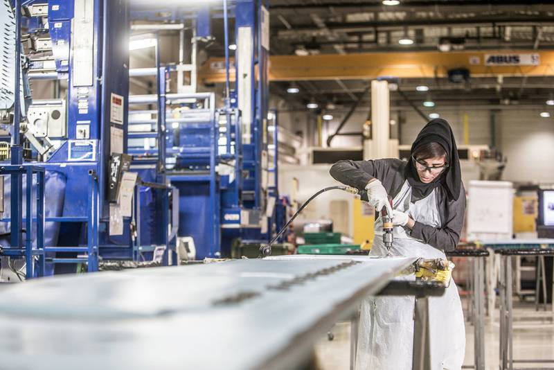 Semi-government owned companies such as Strata, which makes aircraft parts, are major employers of Emiratis. The government wants more privately-owned companies to hire Emiratis. Photo: Mubadala