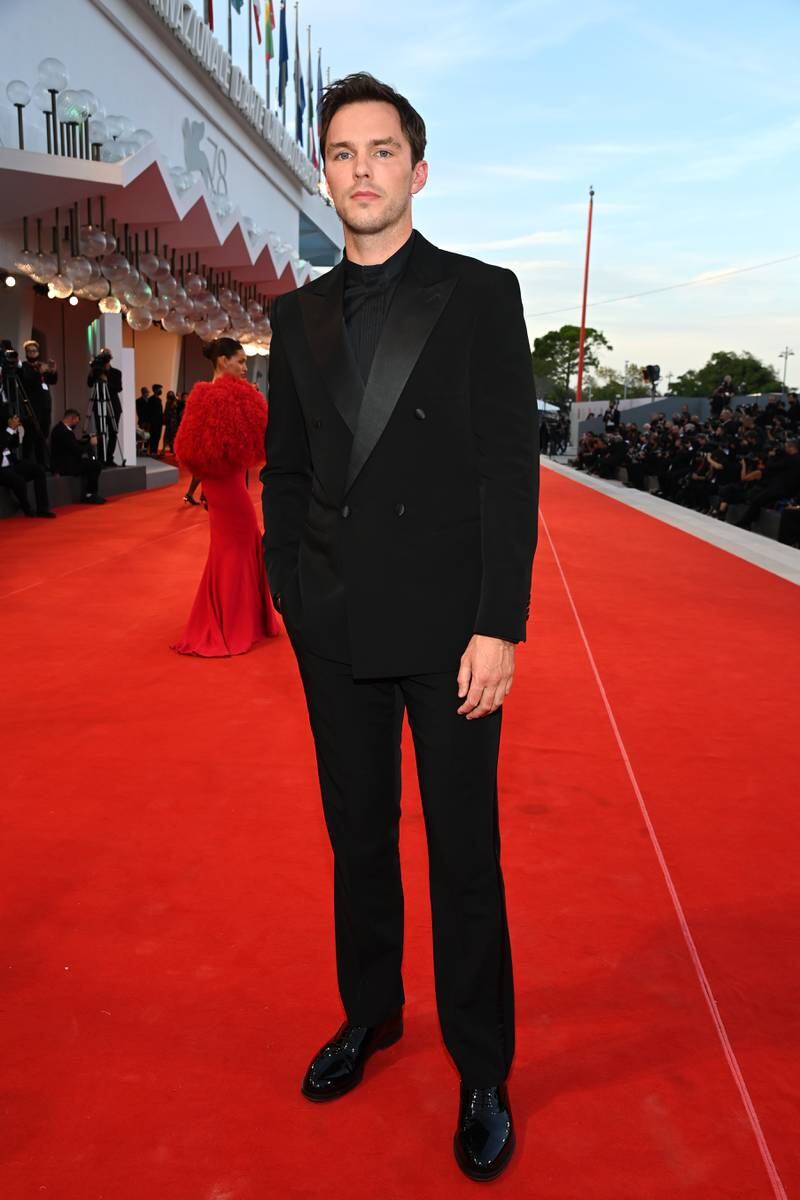 Nicholas Hoult, in all black, arrives at the premiere of the film 'Official Competition' during the 78th edition of the Venice Film Festival. Getty Images